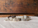 Forged in Flame Mixed Metal Textured Rings